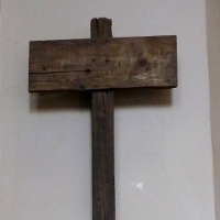 An original wood cross placed on the battlefield at Loos in 1918.